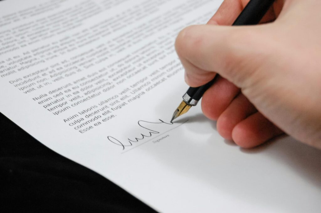 image-of-someone-signing-a-document